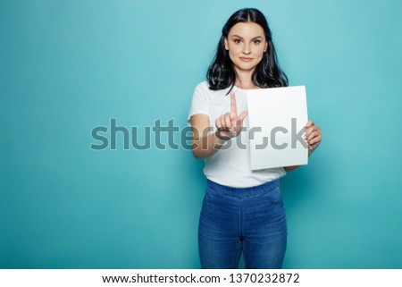 Woman holding white sheet