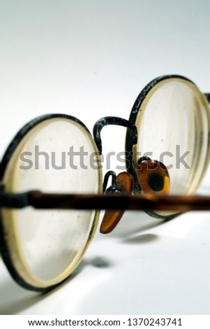 Isolate photo of old dirty damage eyeglasses with space for write wording, dangerous eye ware high risk of infection, major cause of blindness that affect quality of living, economy and health problem