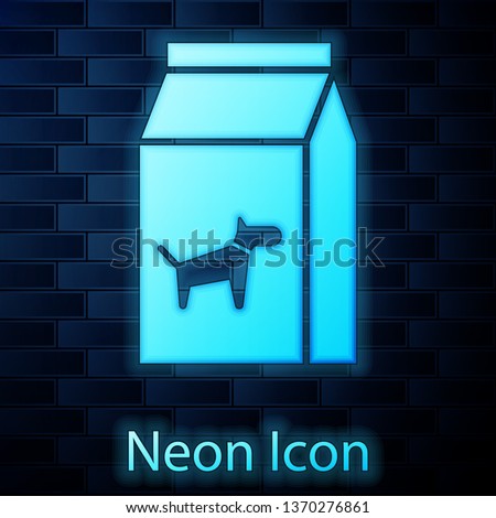 Glowing neon Bag of food for dog icon isolated on brick wall background. Food for animals. Pet food package. Vector Illustration