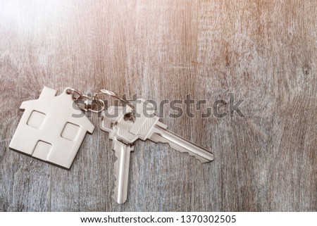 House keys   on wooden floor  background.