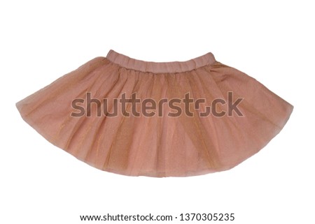 Girls clothes. Festive beautiful brown glistening little girl short summer skirt isolated on a white background. Ballerina kids clothes.