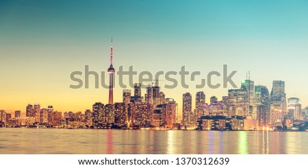 Toronto city skyline and lake Ontario at night. Canada