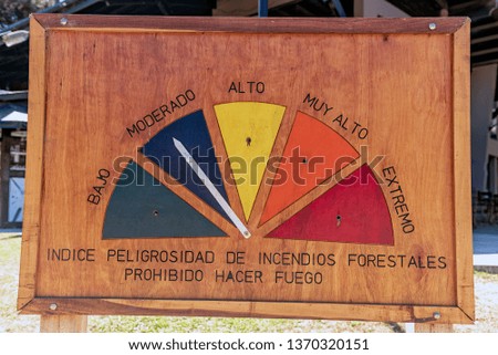 Sign of forest fire meter with the arrow marking "moderated" - "Index of dangerousness of forest fires, prohibited to make fire"