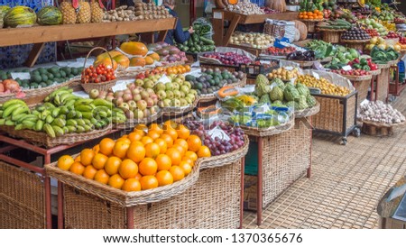 The central street market located in capital of Madeira, city of Funchal. Madeira Island, Portugal. Royalty-Free Stock Photo #1370365676