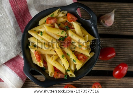 One pot pasta penne with tomato and parsley