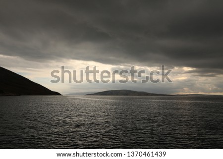 stormy clouds evening Royalty-Free Stock Photo #1370461439
