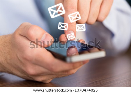 Woman hand using smartphone and it's show 1 email recieve notification icon pop up on screen of mobile phone. Business communication  technology concept.
    
    - Image
