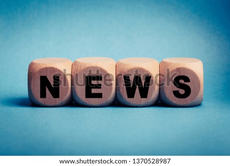 News Text Wooden Blocks for business concept.