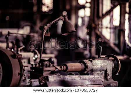 Old steel factory. Retro photography. Old factory industry. Photography. Metal pipes. Dark interior of large halls for production or warehouses.soft focus.