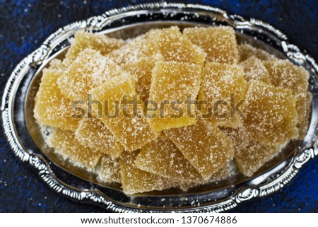 Marmalade on a blue background. Food background
 