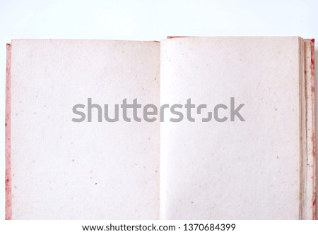 Light brown book with old paper for writing text notes.