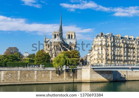 View of the cathedral of Notre Dame and the river Seine. Three years before the great fire.