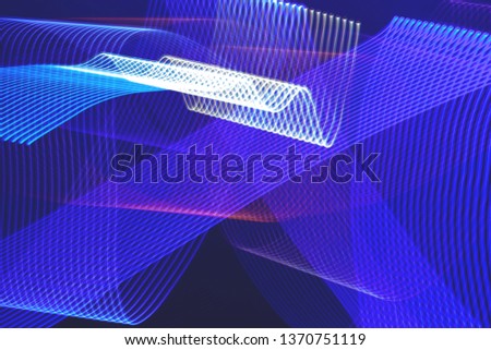 Abstract glowing ribbons folded in stripes and waves. Web design, background.