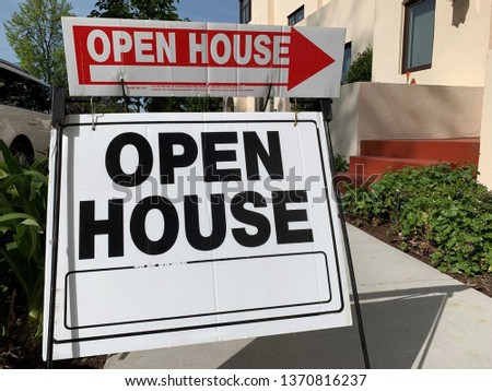 An Open House sign for real estate.