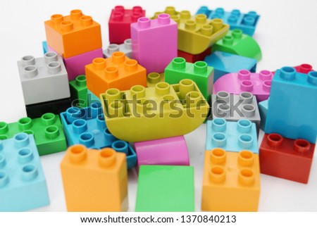 Construction designer for children. Building blocks. Multi-colored cubes for children. Teaching children. Geometry study.