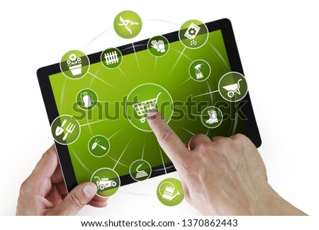 gardening equipment e-commerce concept, online shopping on digital tablet, hand pointing and touch screen with garden tools icons, isolated on white background