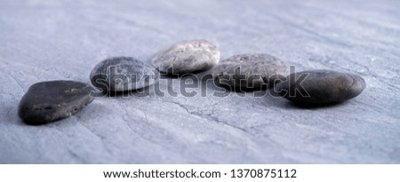 Stones include grey and brown color as a background