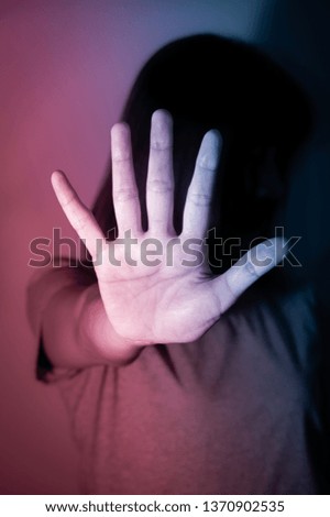 Woman make stop sign with hand, two tones color.