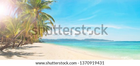 panoramic image of sunny day on white sand tropical beach, Boracay island, the Philippines Royalty-Free Stock Photo #1370919431