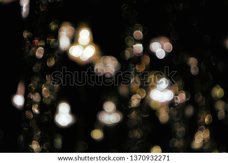 abstract background bokeh, real bokeh from light, round blurred gold color, background texture
