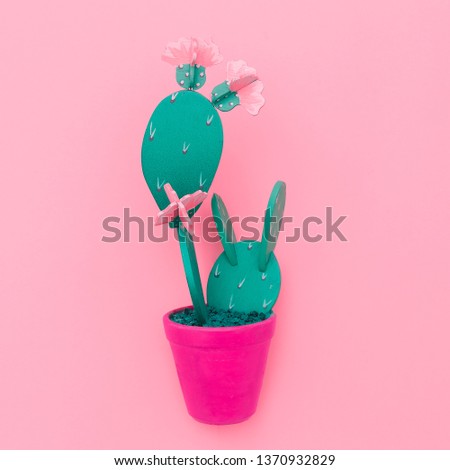 Wooden cactus on pink background. Plants on pink concept. Minimal