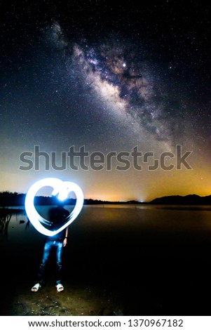 Milky way with Light painting the heart shape 