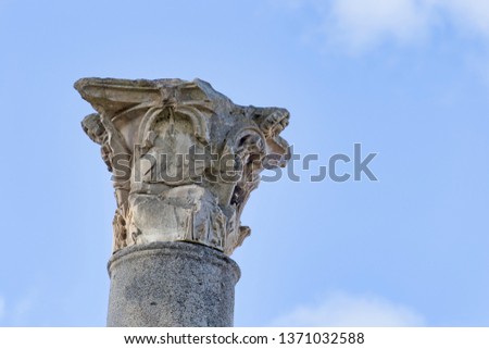 Ancient Roman capital close up in archaeological excavations of Ostia Antica - Rome - Italy