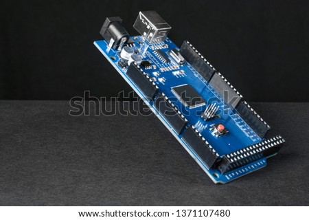 Mega Arduino DIY board isolated on black background close up