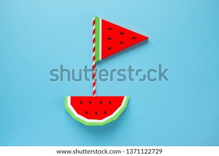 boat, laid out from the slices of watermelon.