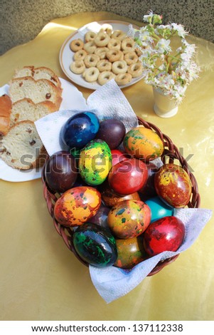 Colorful eggs and festive cake for Easter
