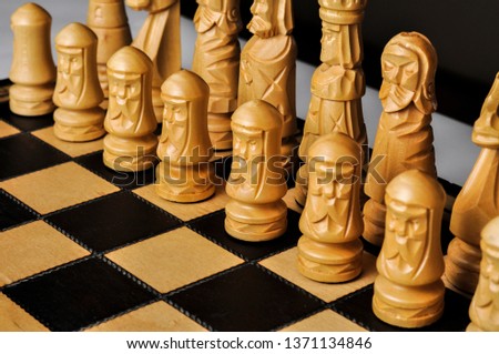 Chessboard figures on the board. To meet each other. checkmate