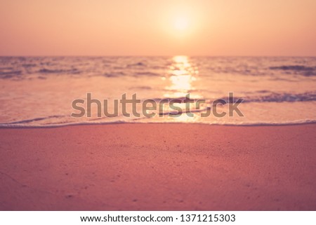Tropical beach with sunset sky and cloud background. Copy space of summer vacation and holiday travel freedom concept. Vintage tone filter effect color style.