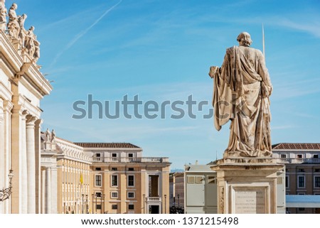 Saint Peter Basilica building with St Paul statue Vatican Rome