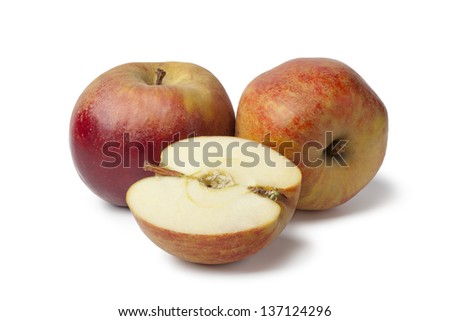 Fresh whole and half Belle de Boskoop apples isolated on white background Royalty-Free Stock Photo #137124296