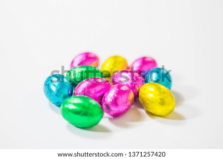 
Colorful easter eggs on pink background