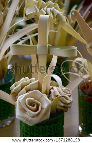 Traditional braided palm leaf, to be blessed on Palm Sunday In the church of Thailand.