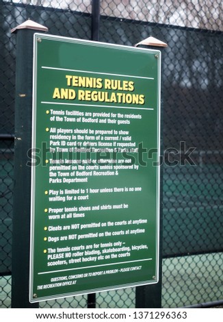 tennis rules regulation sign on public town tennis courts Bedford, New York