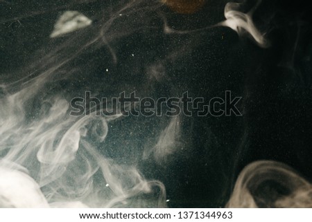 Image of smoke on a dark background