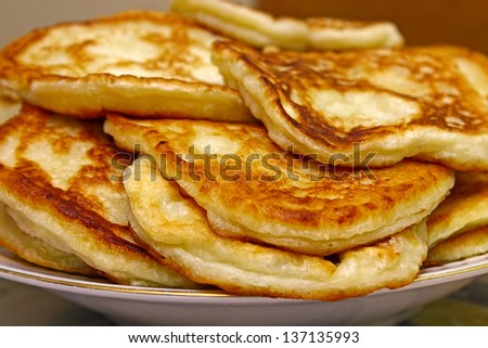 Fritters on  plate for breakfast. Image with shallow depth of field.