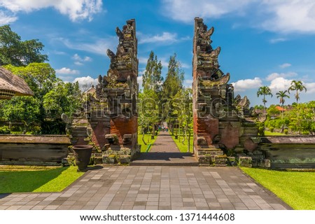 A view down the pathway through the temple of Pura Taman Ayun in the Mengwi district, Bali, Asia Royalty-Free Stock Photo #1371444608