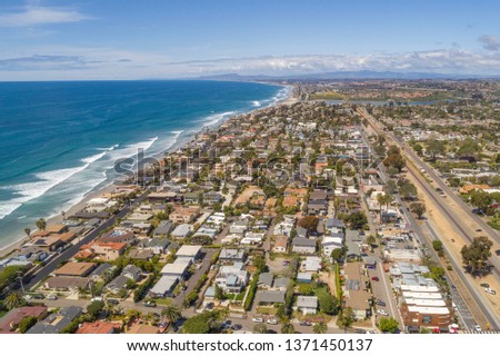 Aerial of Encinitas California along the Pacific Ocean coastline Royalty-Free Stock Photo #1371450137