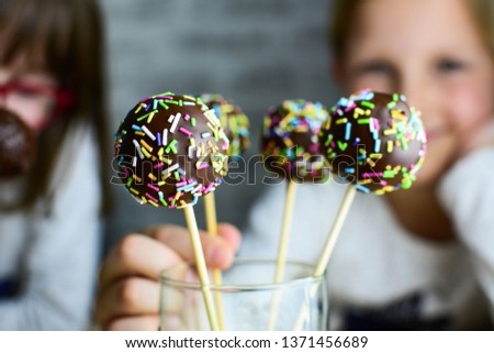 Delicious homemade chocolate cake pops, selective focus. Food, junk-food, culinary, baking and holidays concept. 