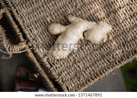 close up of ginger on the basket in the garden Royalty-Free Stock Photo #1371467891