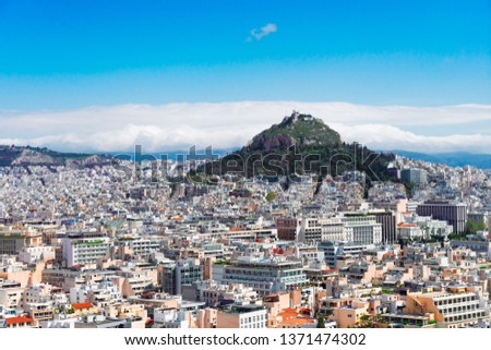 Cityscape of Athens with Lycabettus Hill