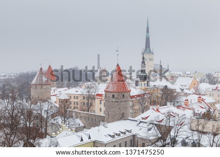 Winter cityscape of old town of Tallinn, Estonia. Rooftop view with magical medieval charm