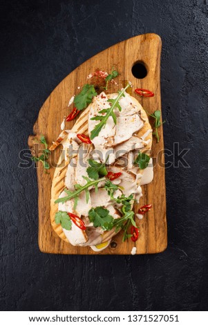 Starters with meat and fish with herbs and vegetables served on wooden boards– stock image