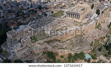 Aerial birds eye view photo taken by drone of iconic Acropolis hill and the Parthenon, Athens historic centre, Attica, Greece