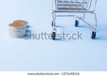 The cart lacks a small concept of coin placement. With a blue background