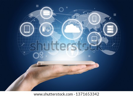 Creative background, male hand with the phone, the image of the hologram of the cloud, blue background. The concept of cloud technology, cloud storage, a new generation of networks. Mixed media