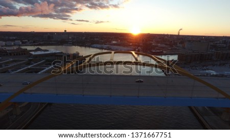 This photo showcases the beautiful Hoan Bridge in Milwaukee at sunset. 